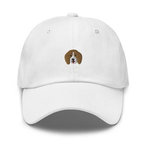 May include: White baseball cap with an embroidered beagle dog face on the front.