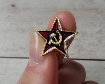 Insigne van de socialistische gemeenschap van de Sovjet-Unie en de martillo van de URSS