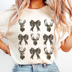 Arco de camuflaje para caza de ciervos (PNG), camuflaje clásico (PNG), camisa con lazo de camuflaje para niña (PNG), sublimación de caza, arco de camuflaje (PNG), camuflaje femenino (PNG)