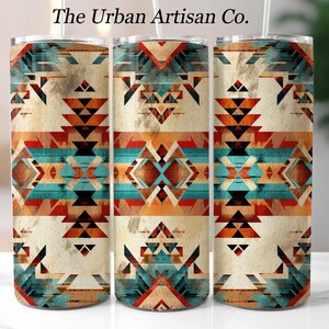May include: Three stainless steel tumblers with a geometric pattern in shades of brown, orange, blue, and turquoise. The pattern is reminiscent of Native American art.