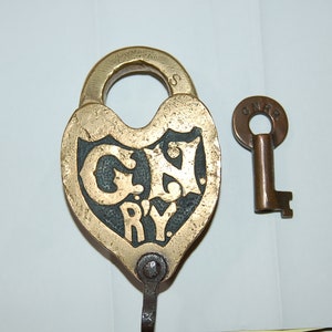 Brass Great Northern Railway Heart Lock by Slaymaker with marked key