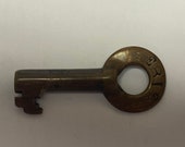 ERIE brass switch key made by Fraim.