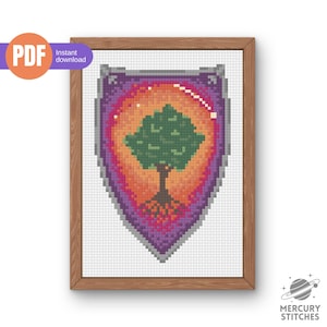 May include: A framed cross-stitch pattern featuring a shield design with a tree in the center. The shield has a purple border and an orange and yellow background. The tree is green with brown roots. The frame is made of wood. The words "PDF" and "Instant download" are in the upper left corner.