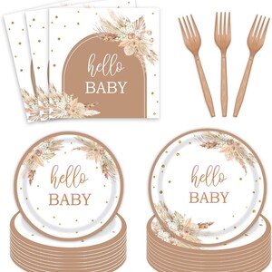 May include: A set of 10 brown paper plates with a white border and gold glitter. The plates feature a watercolor design of dried pampas grass and the text "hello baby". The set also includes 3 wooden forks.