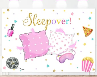 May include: A white backdrop with the words "Sleepover!" in gold glitter. The backdrop features pink and white pillows with stars, a movie reel, a sleep mask, popcorn, pizza, and nail polish.