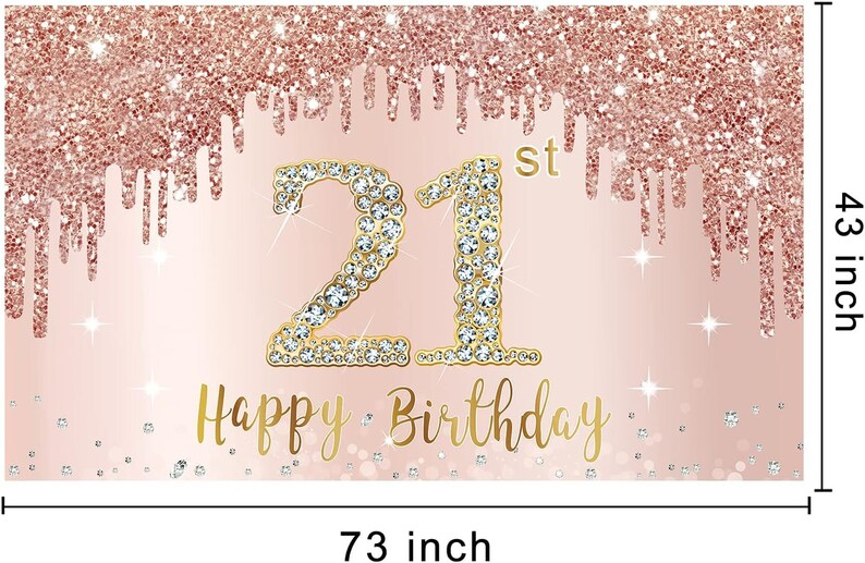 May include: A pink and gold glitter backdrop with the number 21 in gold with rhinestones, and the text "Happy Birthday" in gold script. The backdrop is 73 inches wide and 43 inches tall.