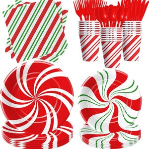 May include: Red and green striped paper plates and cups with a swirl design. Red and green striped napkins. Red plastic forks and spoons.