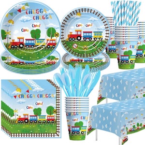 May include: A blue and green train themed party supplies set with plates, napkins, cups, straws, and a tablecloth. The plates feature a cartoon train with the words "Chugga Chugga Choo!" The cups and napkins also feature the same train design.