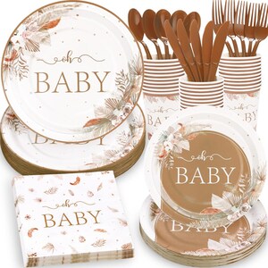 May include: A baby shower party set with brown and white paper plates, napkins, cups, and cutlery. The plates and napkins feature a floral design with the text "oh baby".