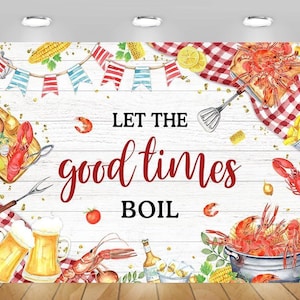 May include: A white wooden sign with red text that reads "Let the good times boil". The sign is decorated with red and white checkered fabric, crawfish, corn on the cob, and beer mugs.