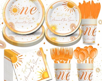 May include: A party supplies set with a sun and rainbow theme. The set includes plates, napkins, cups, forks, spoons, and knives. The plates and napkins have the text "First trip Around the Sun" and the number "one". The color scheme is orange and white.