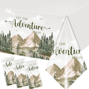 May include: A green and brown table cover with a watercolor design of mountains and trees. The text "Let the Adventure Begin" is printed on the cover.