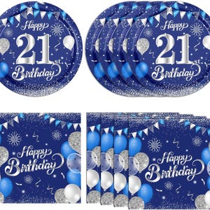 May include: Blue and silver 21st birthday party plates and napkins. The plates have a silver glitter background with blue and white confetti and the text "Happy 21st Birthday". The napkins have a blue background with silver glitter and the text "Happy Birthday".