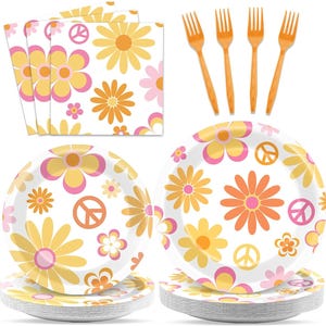 May include: A set of 10 white paper plates with a yellow, pink, and orange flower pattern and peace signs. The plates are stacked in two piles of five. There are also four orange plastic forks and three white paper napkins with the same flower pattern.