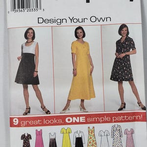 May include: A Simplicity 7653 sewing pattern envelope for size P 12, 14, 16. The white paper packaging features the text Design Your Own and 9 great looks, ONE simple pattern! It displays three dress variations in black and white, yellow, and floral.