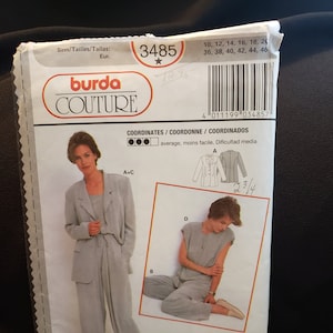 May include: A sewing pattern for a women's suit with a blazer, pants, and a sleeveless top. The pattern is from Burda Couture and is for sizes 10-46. The pattern includes instructions for sewing seams and hems.
