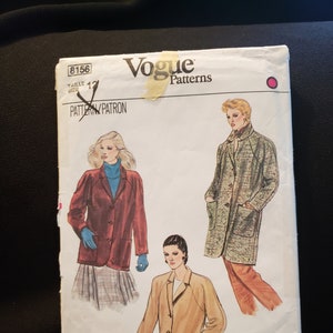 May include: A sewing pattern for a blazer, featuring three different styles. The pattern is from Vogue Patterns and has the number 8156.