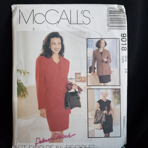 May include: A sewing pattern for a suit jacket and skirt. The pattern is from McCall's and is size 14. The pattern is for a red suit jacket and skirt. The pattern also includes a dress pattern.