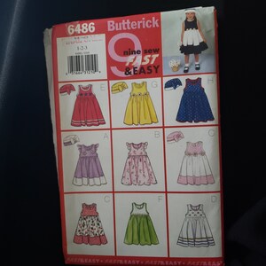 Butterick 6486cute baby/toddler nine different dresses and a pillbox hat, sew fast & easy sizes 1-2-3 UNCUT FF