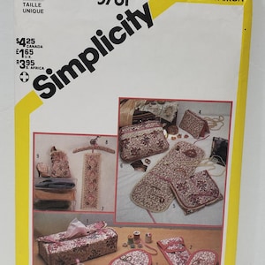 May include: Simplicity sewing pattern 5781. The pattern includes instructions for various projects like bags and cushions. The cover is yellow and white, with the Simplicity logo and project illustrations. One size.