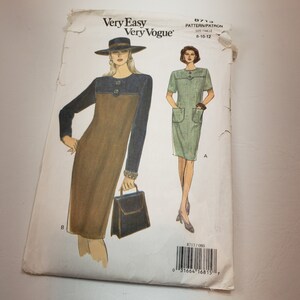 May include: A sewing pattern for a dress, with two different styles. The pattern is called "Very Easy Very Vogue" and the pattern number is 8713. The size range is 8-10-12.