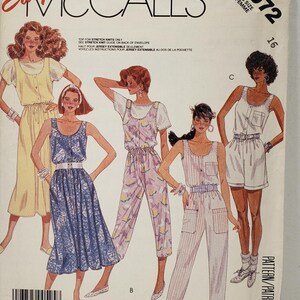 May include: Vintage McCall's sewing pattern envelope with illustrations of women's clothing designs. The designs include a dress, jumpsuit, and shorts. The envelope is labelled "Easy McCall's" and includes the size 16.
