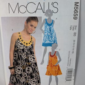 May include: McCall's M5659 sewing pattern envelope for a sleeveless dress in sizes B5 (8-10-12-14-16). The cover features a black dress with white and yellow circular patterns, a yellow neckline with black buttons, and illustrations of two other dress variations.