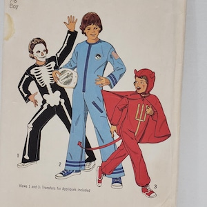 May include: Simplicity sewing pattern number 6696 for a boy's costume. The pattern includes three different costumes: a skeleton, an astronaut, and a devil. The pattern is for sizes 7-8 and is priced at $1.15.