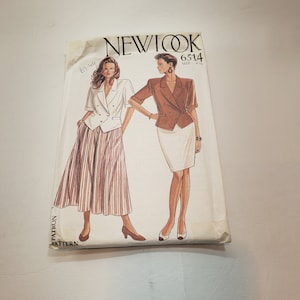 May include: A vintage sewing pattern for a blazer and skirt. The pattern is from New Look and is size 6-14. The pattern is for a double-breasted blazer with a skirt that has pleats. The pattern is in brown and white.