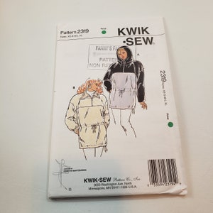 May include: Sewing pattern for a hooded jacket with a drawstring waist. The pattern is from Kwik Sew and is for sizes XS-S-M-L-XL. The pattern includes instructions for making two different styles of jackets.