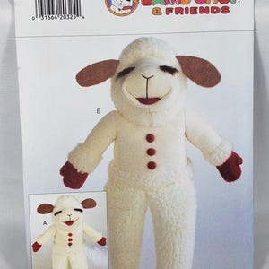 May include: A Butterick sewing pattern for a Lamb Chop costume. The pattern shows a plush lamb costume with a smiling face, brown ears, and red accents. The pattern includes the text "Lamb Chop & Friends".