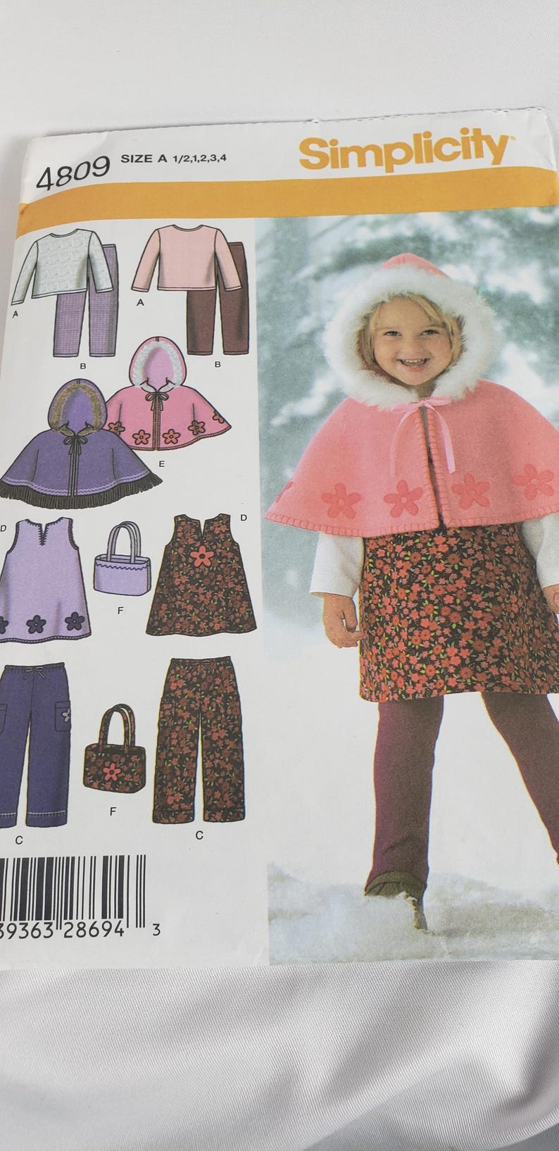 Simplicity 4809 Toddlers’ Jumper, Pants, Caplet, Bag, Knit Top and ...