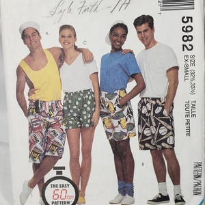 May include: McCall's pattern envelope featuring a group of people wearing shorts and tops. The pattern number is 5982, size EX-SMALL. The text "THE EASY 60 MIN PATTERN" is also visible.