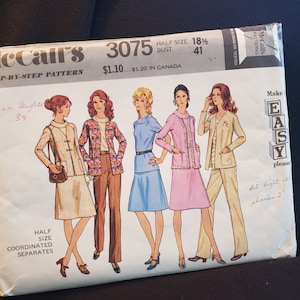 May include: Vintage McCall's sewing pattern envelope for a women's dress and jacket. The pattern number is 3075 and the size is 18 1/2, bust 41. The envelope features a photo of five women modelling the different styles. The text "Make Easy Please" is printed on the envelope.