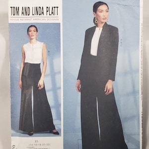 May include: A Vogue Patterns sewing pattern envelope for Tom and Linda Platt designs, labelled V1620. The front displays two outfits: a white sleeveless top with wide-leg black trousers, and a black blazer over a white top with matching black trousers.
