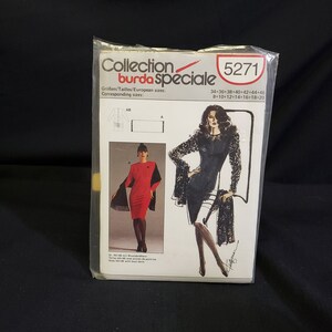 May include: A sewing pattern for a dress and a shawl. The pattern is from Burda Speciale Collection 5271. The pattern includes sizes 34-46 and 8-20.