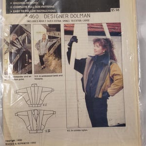 May include: A MacPhee Workshop sewing pattern envelope for Designer Dolman number 460, dated 1990 and 1992. The front features illustrations of three jacket styles, technical line drawings, and text including Unique Patterns and adult sizes.
