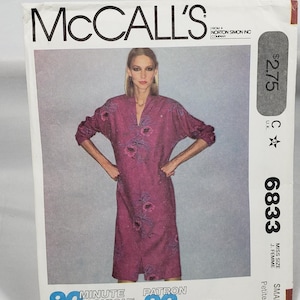 May include: A McCall's sewing pattern packet showing a woman in a floral dress. The packet includes the text "90 Minute Fashion" and the size "Small". The price is $2.75.
