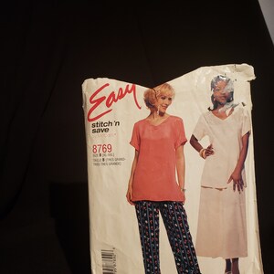 May include: Sewing pattern for a loose-fitting top and trousers. The pattern is for sizes XL-XXL and is called "Easy Stitch 'n Save" by McCall's. The pattern number is 8769.