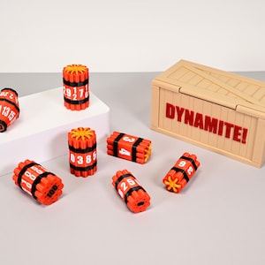 Juego de 7 dados poliédricos con forma de TNT (D4-D100) imagen 1