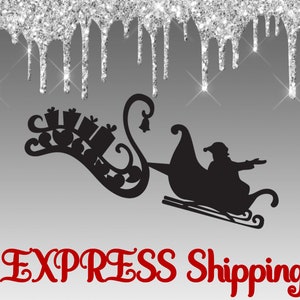 May include: A black silhouette of Santa Claus in a sleigh with presents, flying against a silver glitter background with the text "EXPRESS Shipping" in red.