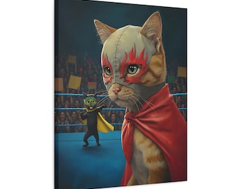 May include: A canvas print featuring a ginger tabby cat wearing a grey mask with red flame patterns and a red cape, standing in a wrestling ring. In the background, a smaller black cat in a green mask and yellow cape poses.