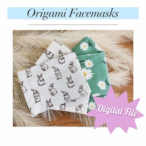 May include: Two origami-style face masks featuring fabric patterns. One mask is white with a repeating brown rabbit print, and the other is green with a white daisy print. The text "Origami Facemasks" and "Digital File" are visible.