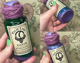 False Life Liquid Elixir -D20 Roller - Colorshift from Green to Purple-Blue