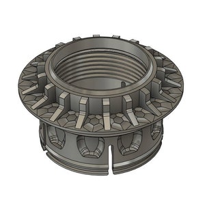 May include: A silver metal nut with a hexagonal shape and a threaded center. The nut has a decorative design around the outer edge.