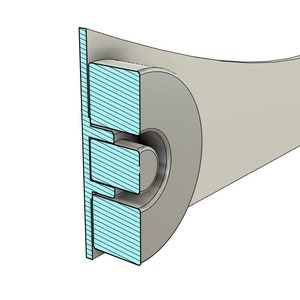 May include: A close-up of a light gray metal arm with a blue and white striped piece attached to the end. The arm is curved and has a small hole at the end.