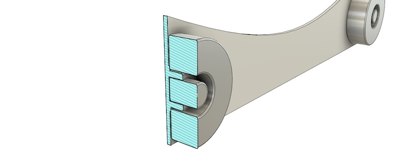 May include: A close-up of a light gray metal arm with a blue and white striped piece attached to the end. The arm is curved and has a small hole at the end.