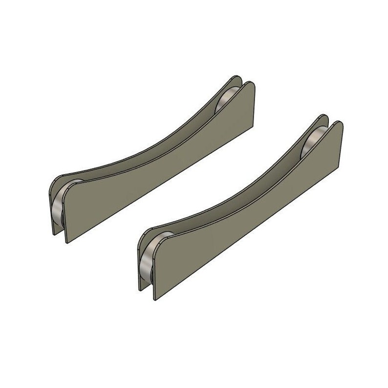 May include: Two metal brackets with a curved shape and a round hole at each end. The brackets are a light brown color.