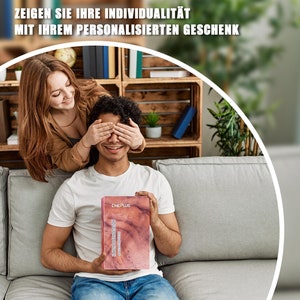 May include: A person is covering another person's eyes with their hands. The person receiving the surprise is holding a gift box with the word "OnePlus" printed on it. The gift box is wrapped in a wood-grain pattern.