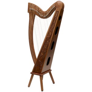 May include: A wooden harp with intricate carvings and strings. The harp has a dark brown finish and is supported by a three-legged stand. The soundboard features floral and leaf designs, and the strings are visible.